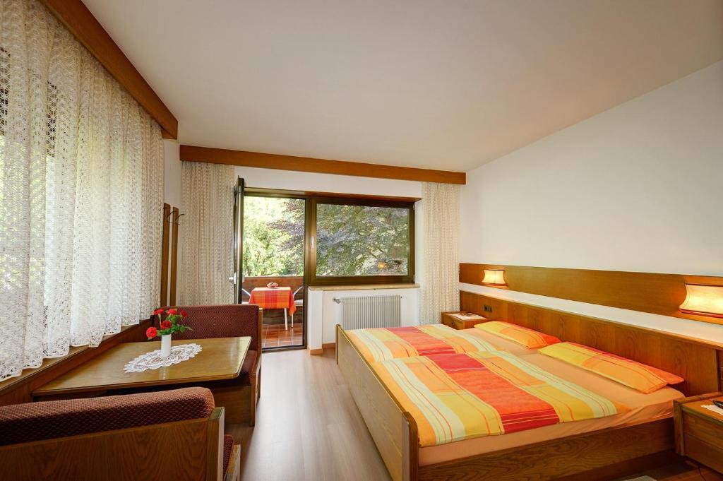 Apparthotel Taufenbrunn Parcines Ruang foto